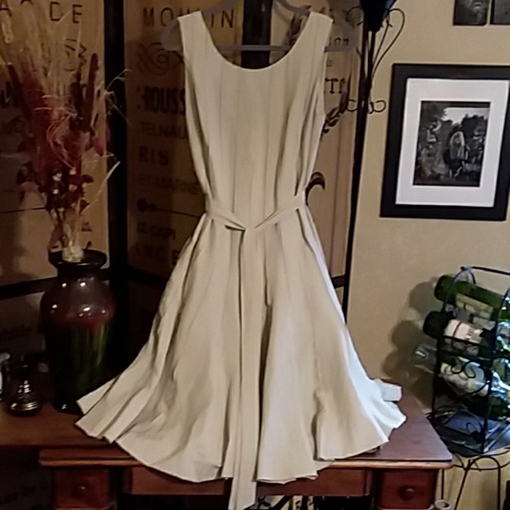 A Calvin Klein sleeveless pleated summer dress.